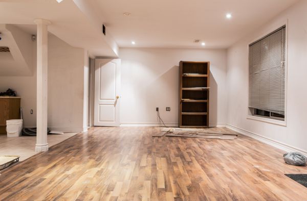 Modern basement with vinyl flooring in St Peters, MO